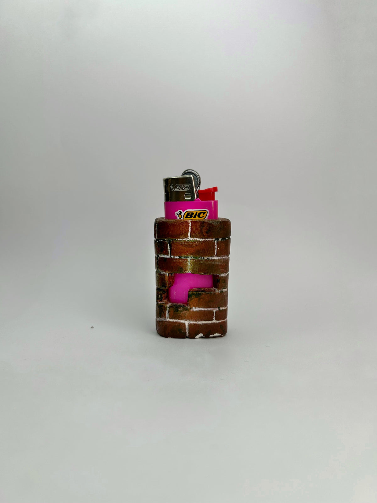 Brick Lighter - “The Hole Inna Wall”